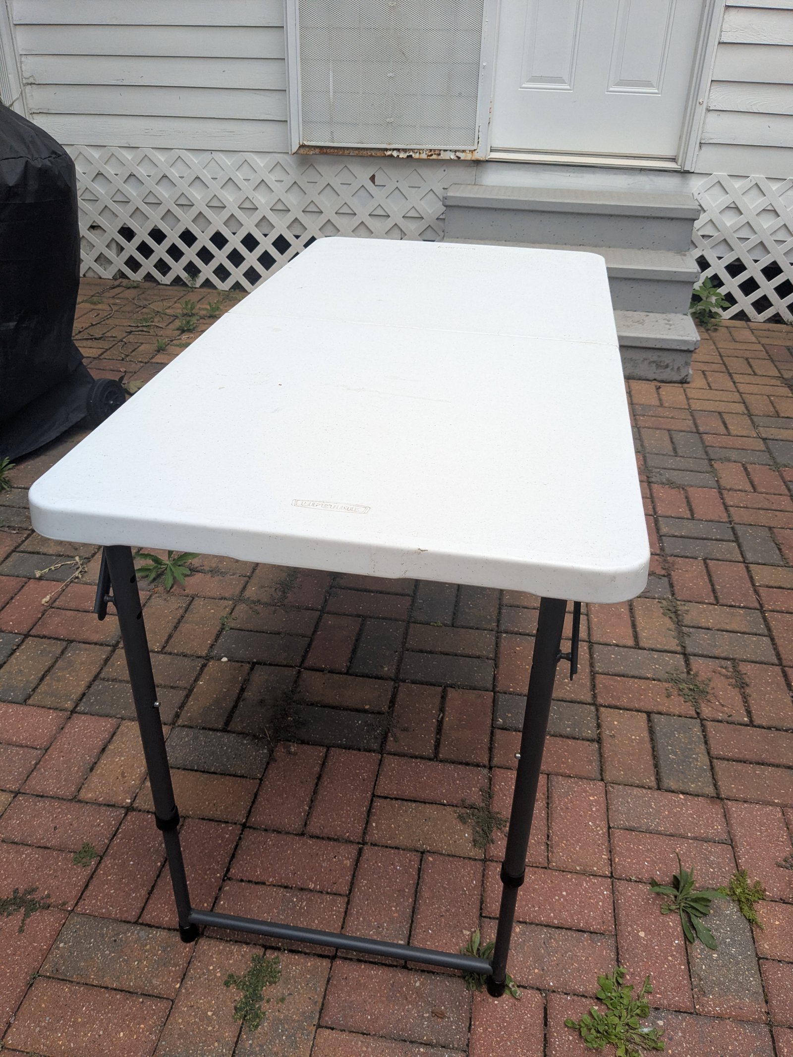 Lifetime 4-ft fold-in-half adjustable table