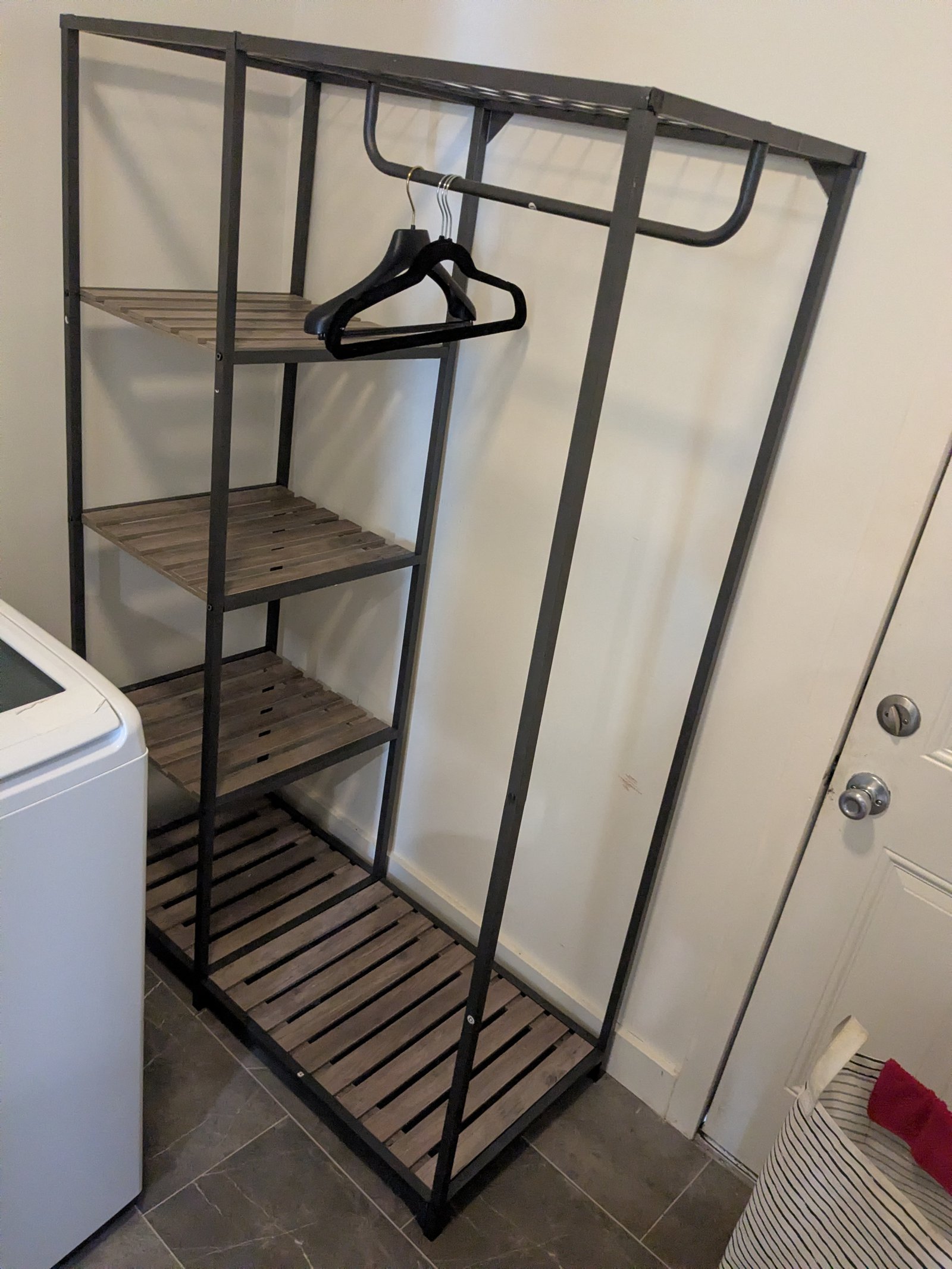 Metal garment rack with wood shelves